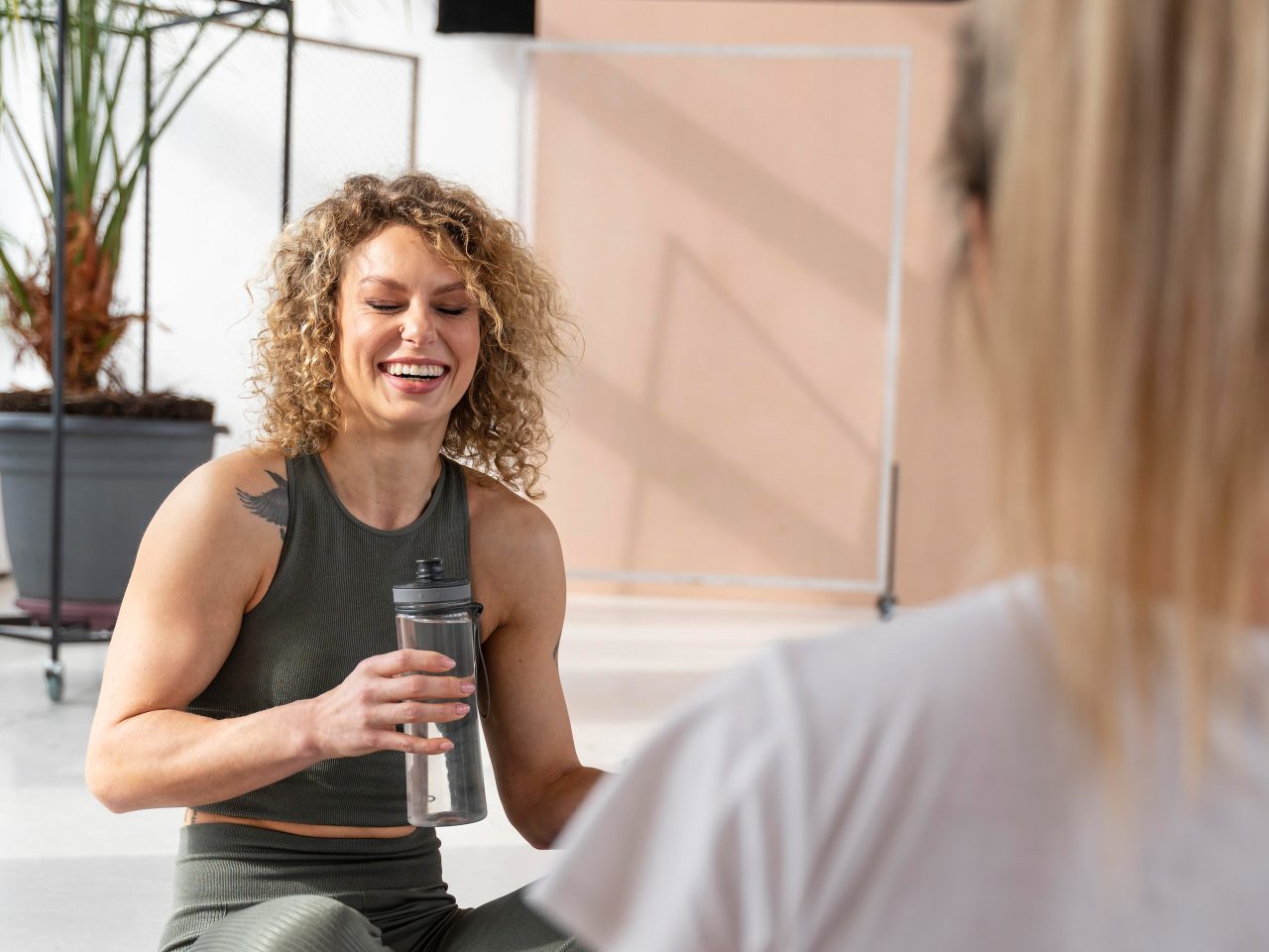 close-up-women-indoors-with-yoga-mat